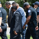 US Capitol Police detain Rev. Jesse Jackson, Sr. (2nd L) as he joins demonstrators in blocking traffic as they call for Senators, specifically US Senator Joe Manchin, Democrat of West Virginia, to support the elimination of the Senate filibuster in order to pass voting rights legislation and economic relief bills, as they protest during the “Moral March,” on Capitol Hill in Washington, DC, June 23, 2021.